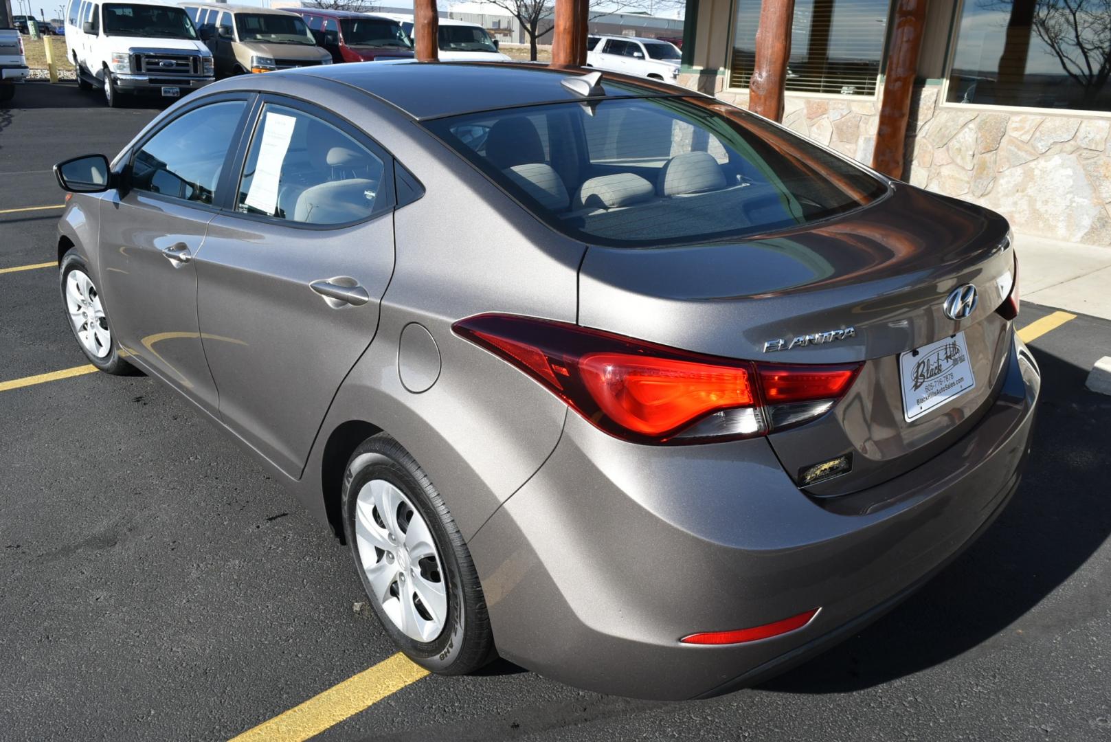 2016 Bronze Hyundai Elantra SE (5NPDH4AE3GH) with an 1.8L 4 Cyl engine, 6-Speed Automatic transmission, located at 1600 E Hwy 44, Rapid City, SD, 57703, (605) 716-7878, 44.070232, -103.171410 - Photo#5